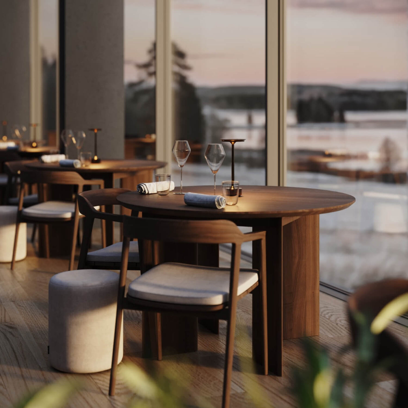 Shelby rechargeable table lamp in a restaurant setting at sunset